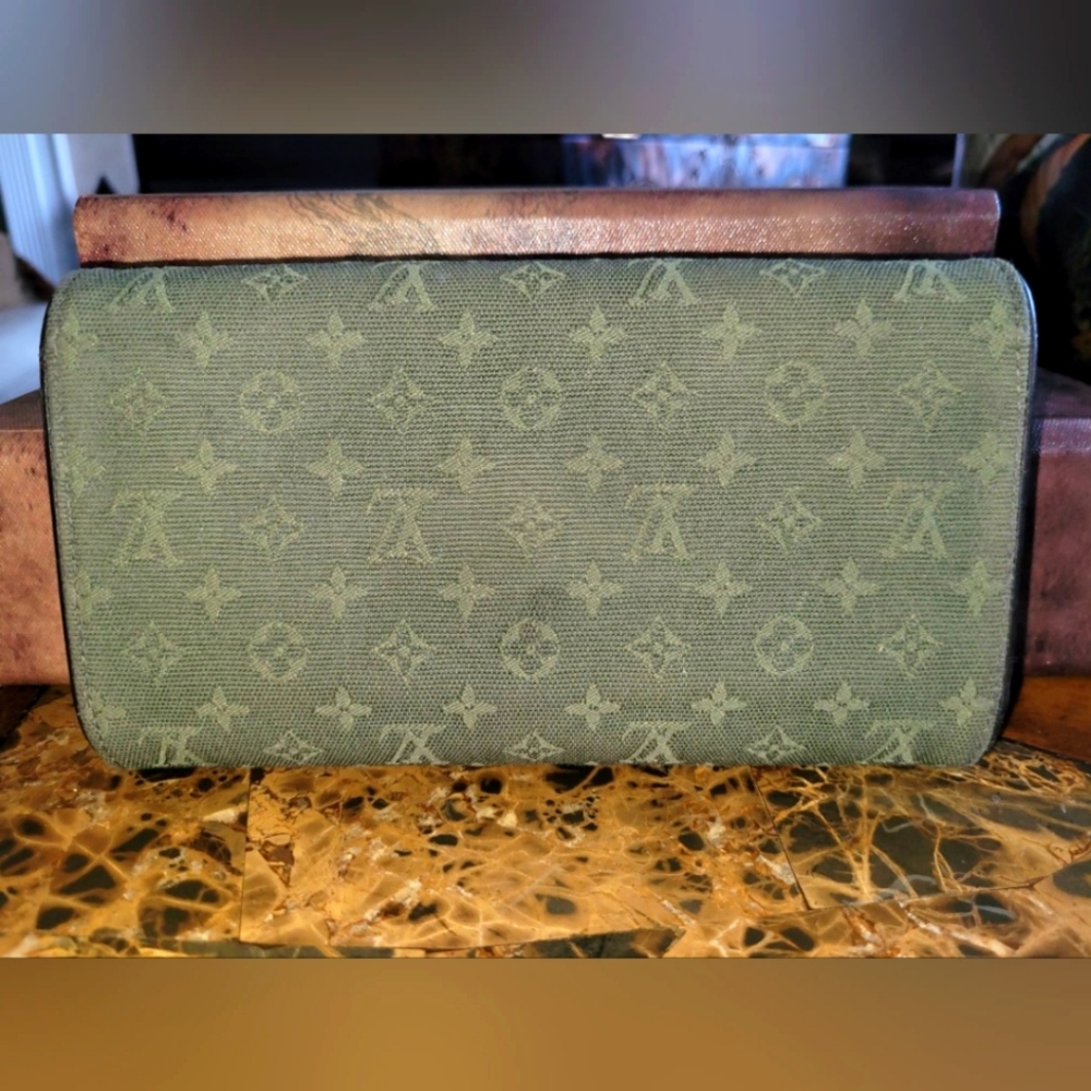Louis Vuitton mini run porte international - Picture 2 of 11